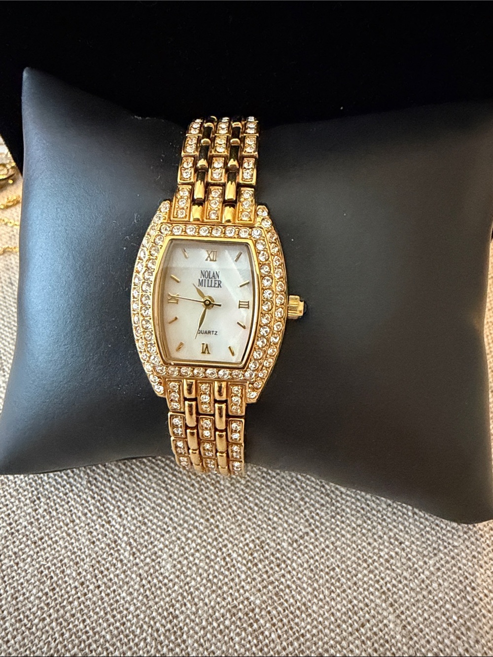 Nolan Miller Gold Crystal Bracelet Watch with White Dial